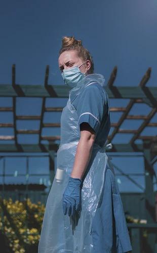A nurse pictured in PPE